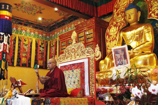 Karmapa playing drum